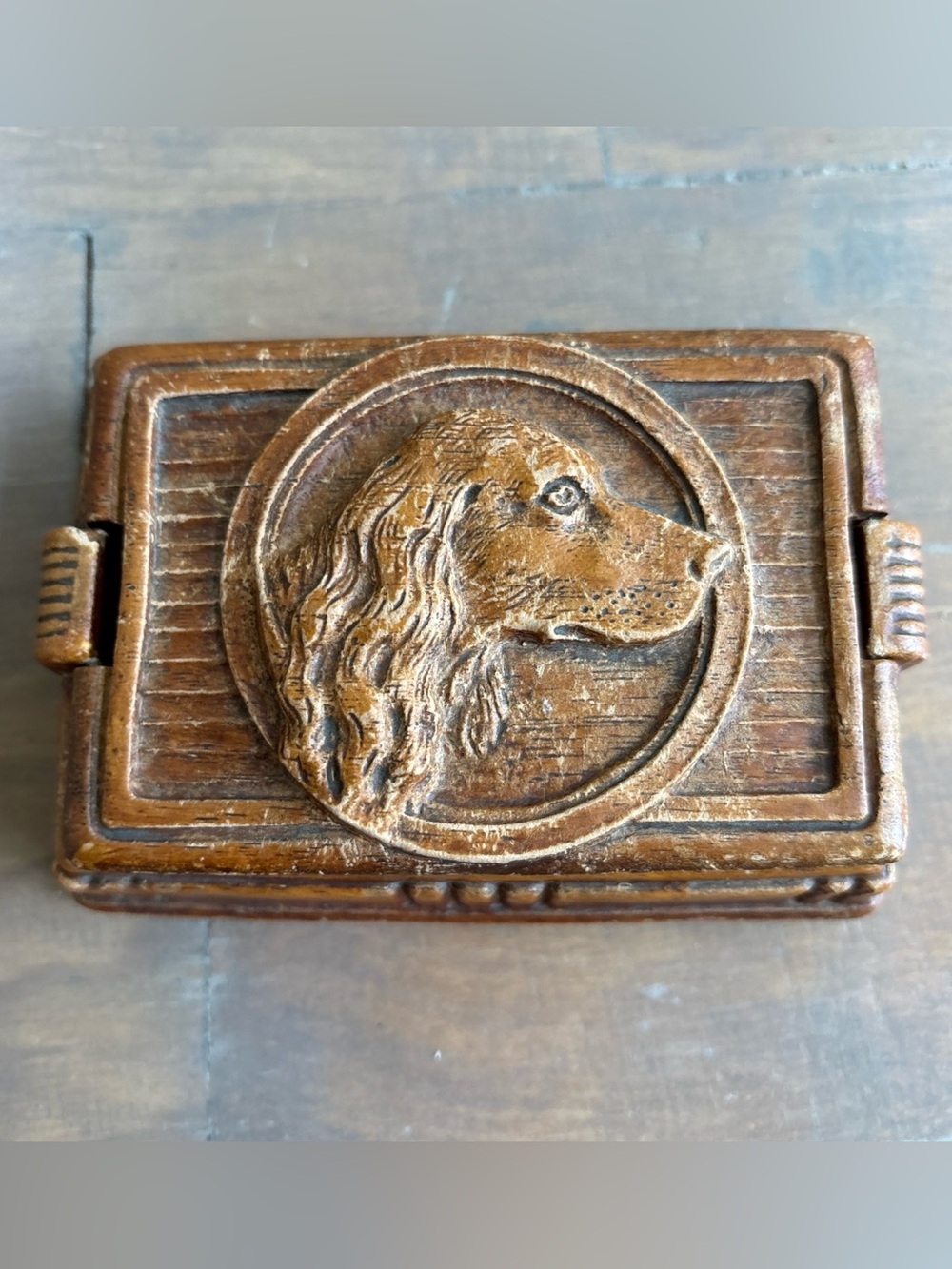 a vintage wood-composite trinket or cigarette box 1940’s